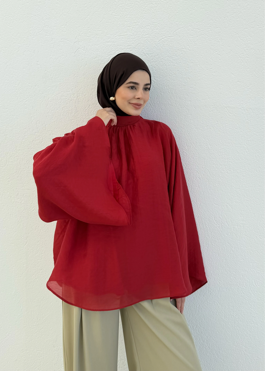 The drap blouse