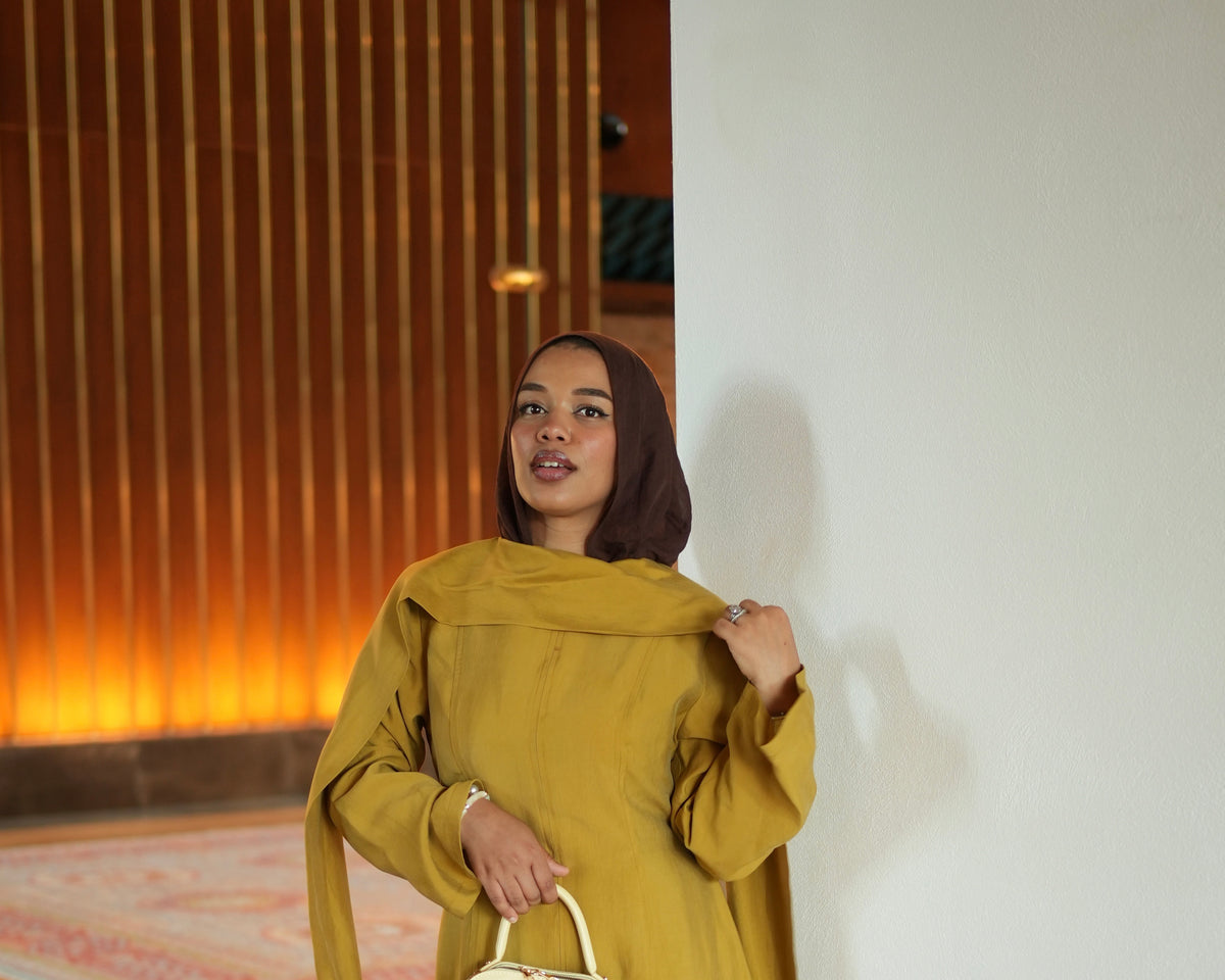 The Cape Dress in Mustard
